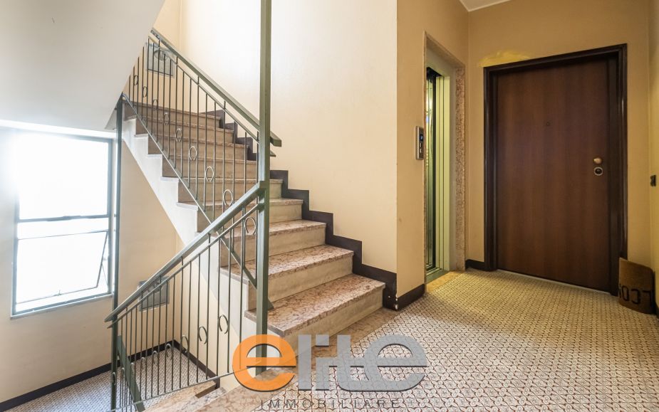 The apartment opens onto a living room with a brand-new, never-used open-plan kitchen